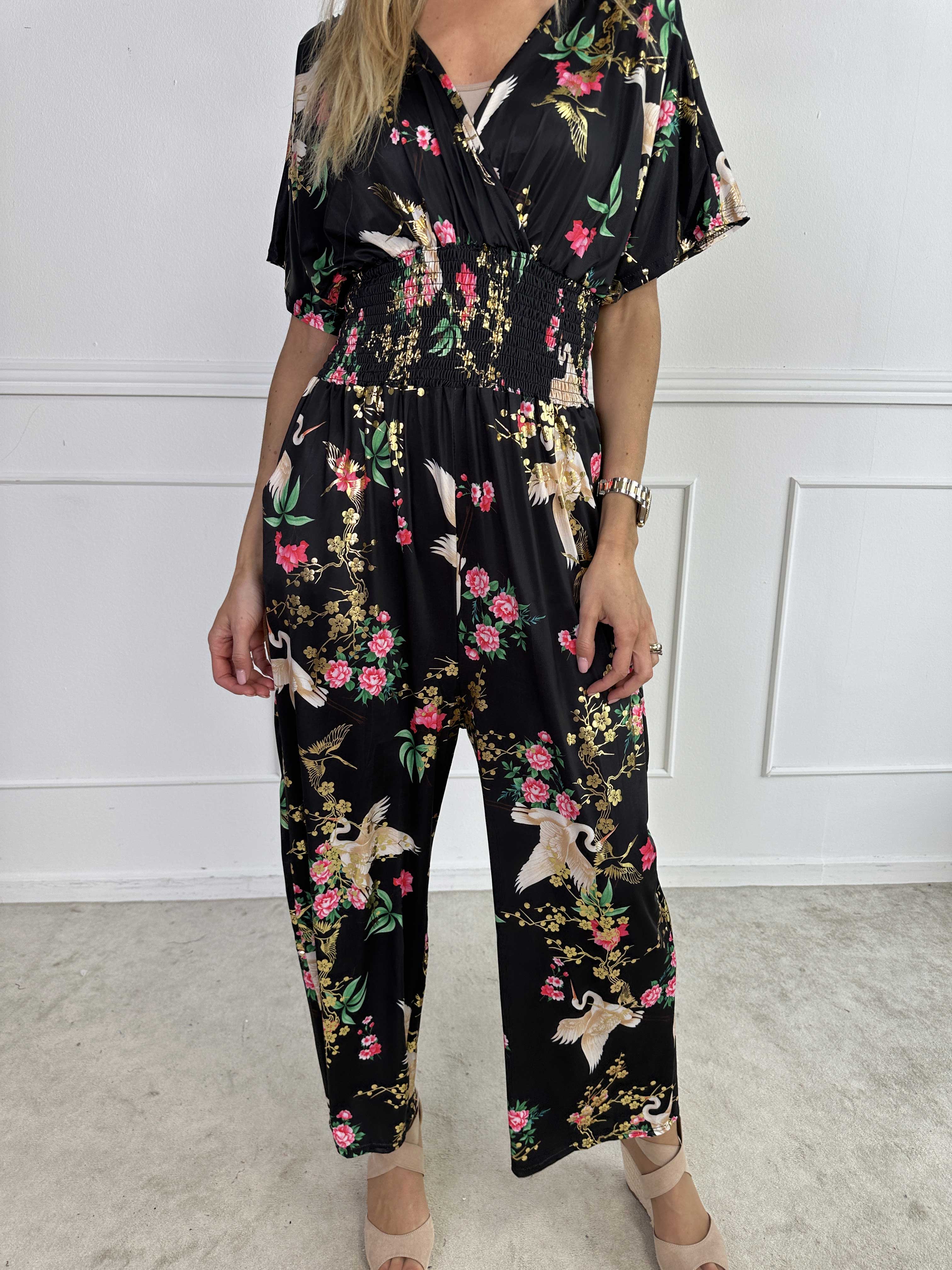 Pams Fly Jumpsuit - Elastisk buksedragt med blomster- og fugleprint